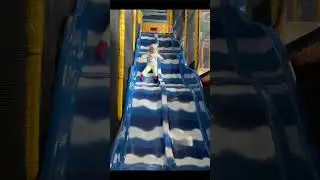 Maya slides down a huge slide /Майя скатывается с огромной горки #shorts