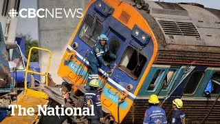Crane crashes onto moving train in Thailand, killing dozens