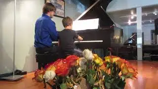 Nathan  ~ Playing with his student Graham at the Recital