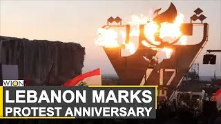 Lebanon mark first anniversary of protest movement | Protesters light 'torch of revolution'