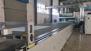 Efficient Airbag Fabric Processing:  Automatic Spreading Machine in Action