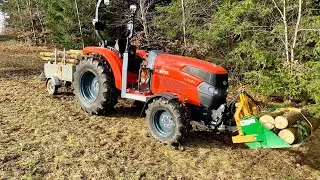 Kubota L1421 im Einsatz beim Beseitigen von Wind- und Schneebruch