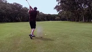 Nice Drive!  Tight 9 Iron!  Dog Leg Right