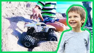 Monster Trucks Play in the Sand