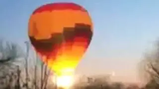 Watch: Hot air balloon crashes into power lines