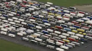 Trucks wait on UK airfield amid France travel ban