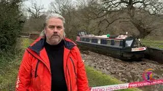 Boat stranded on canal hole edge pulled to safety