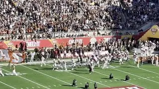 Texas Longhorns takes the field before the Cheez-It Citrus Bowl