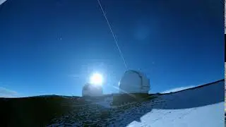 Moonrise over double Keck Lasers