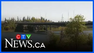 Saskatoon emergency crews rescue a person from the South Saskatchewan River