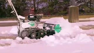Maintain Walkways with a Snow Bull