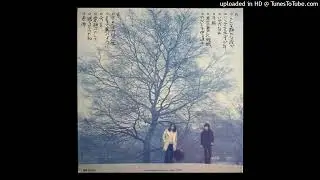 風車 - リンゴを売る少年