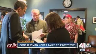 Congressman Yoder talks to protesters