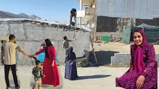 Mahin and her siblings، Adel and Sadeq finishing the roof of the house