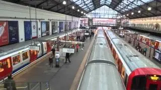 8 District Line trains at Earl's Court
