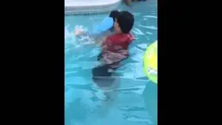 Too teaching Chris how to swim