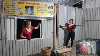The girl opened a repair shop alone. Welded the door and built a new repair garage frame.