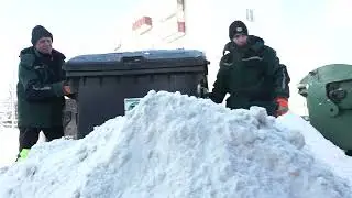 It's not easy to remove trash from snow-covered yards.