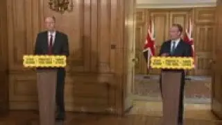 UK says social distancing may last until year end