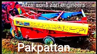 potato digger in field