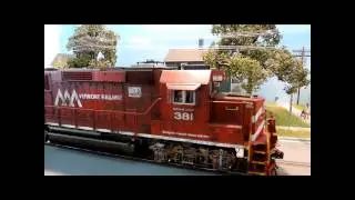 Closer view on a slowly passing Atlas O-Scale GP60 Vermont Railway