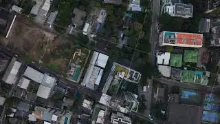 High angle top down shot of Bangkok's residential area. Urban landscape featuring buildings