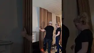 Assembling slat walls from Wallribbon on concrete wall