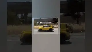 A yellow jeep renegade midsize SUV