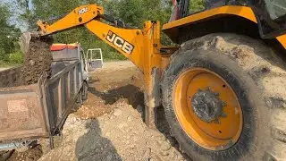JCB Machine's Front Bucket Loading Gravel In Hyva Truck @DronePlanet