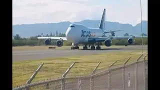Atlas Air Cargo 747-400 passing by and takeoff