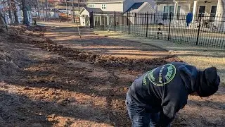 Brooks Landscaping is installing a Custom Dry Creek Bed LIVE!!!