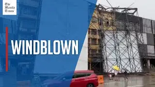 2 vehicles damaged as billboard falls in Quezon City