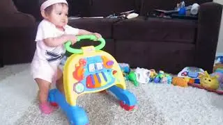 McSweets on her fisher price walker