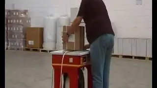 Обвязка пластиковой лентой с помощью Transpak TP-502