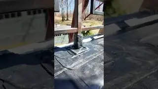 Wrapping the Base of a Post With the Rubber Roof