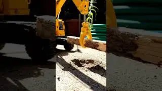 Mini Excavator Master: Watch This RC Machine Lift a Heavy Log! 🚧