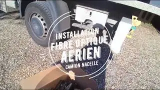 Installation d'une ligne fibre optique en aérien avec camion nacelle
