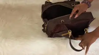 Coach Dreamer 36 with border rivets