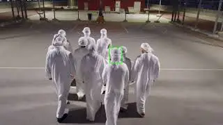 Drone-Person Tracking in a Uniform Appearance Crowd: A New Dataset