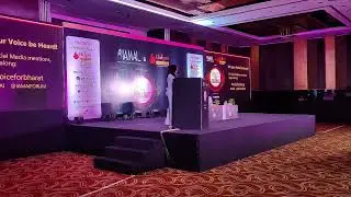Award-winning Emcee opens a conference