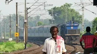 Crazy Old man got scared when 130 KMPH Roaring BAAZ EMD leads NJP Shatabdi approaches him !!!