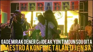 Dener Céide fè mirak ak yon timoun sou gita, Nan lakou Leogane. Tout moun sezi