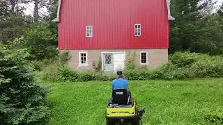 Mowing behind the barn in tall wet grass with my Ryobi Electric Tractor - real time 4K
