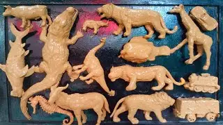 cleaning muddy animal toys,lion, cow, tiger, crocodile, zebra, goat, giraffe, elephant, sea horse