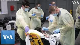 US Military Treats Virus Center at Field Hospital in New York City Convention Center