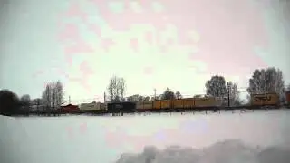 Green Cargo freight train passing village of Tidan in Sk&ouml;vde county.
