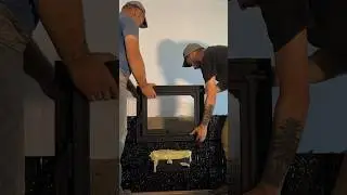 Installation of fireplace doors.
