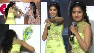 Anupama Parameswaran Draws Peacock Feather On Stage | Karthikeya 2 Pre Release Event | News Buzz