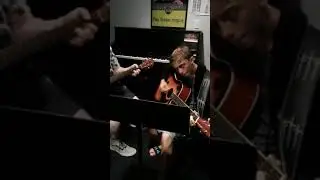 Dan & Aiden practicing an awesome guitar piece