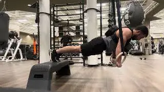 Weighted Ring Push Ups (7 reps 40 lbs)